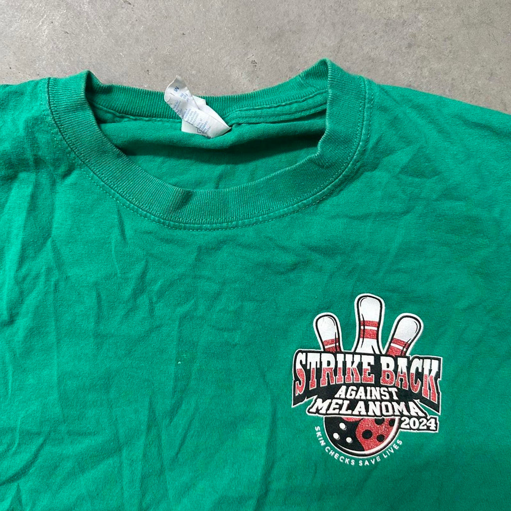 Green Strike Back Against Melanoma Graphic Tee #melanomaawareness