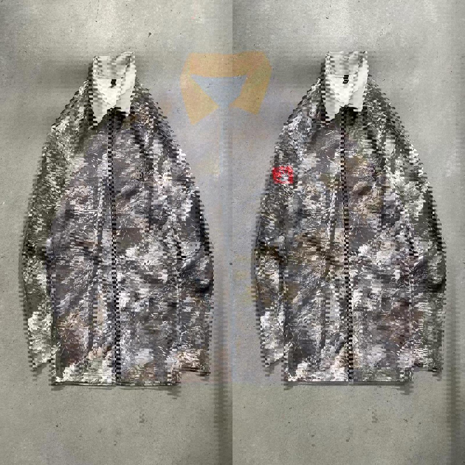 Real-Tree Like, Camo Jacket With Embroidered “Live On” Patch