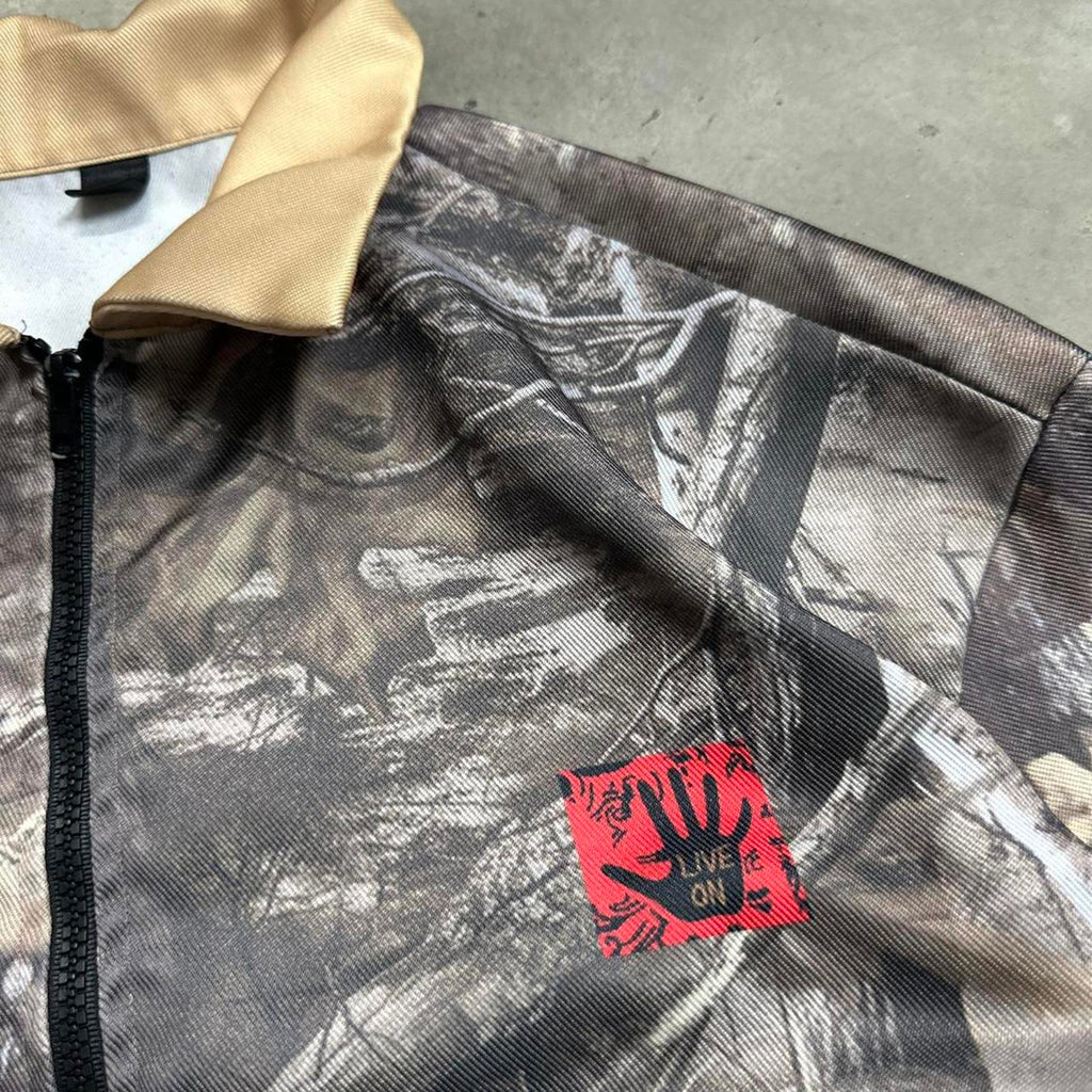 Real-Tree Like, Camo Jacket With Embroidered “Live On” Patch