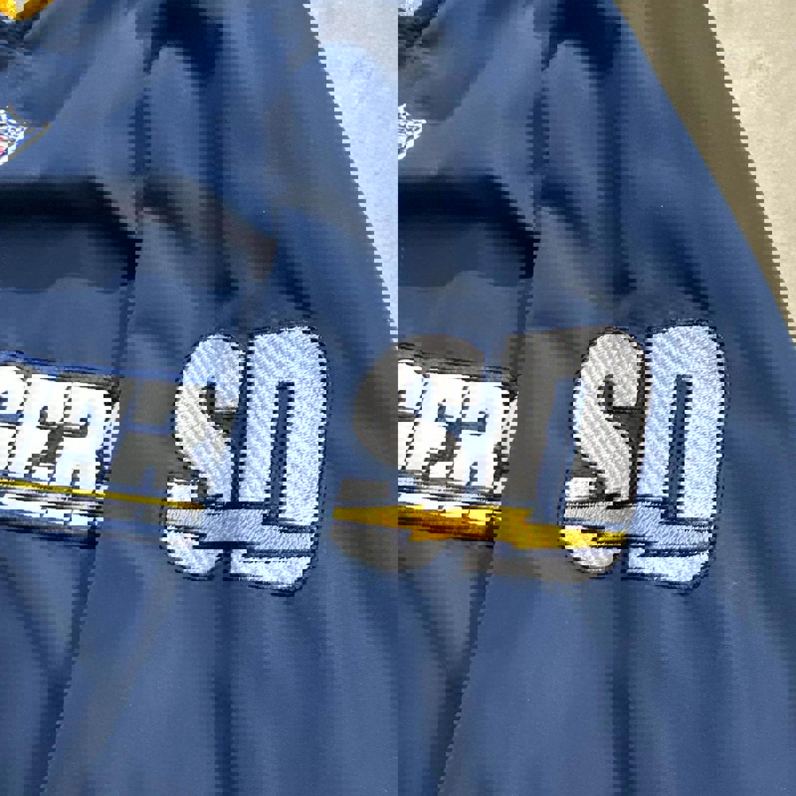 Vintage 2000’s SD Chargers Embroidered Patch Windbreaker Zipperless Jacket